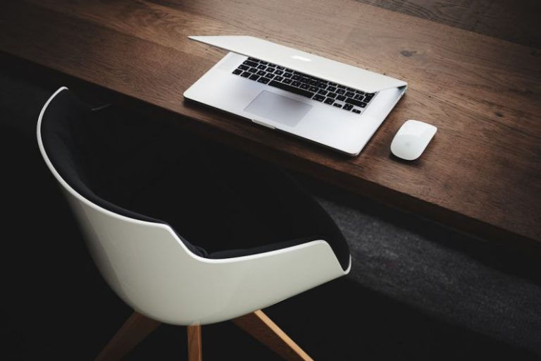 Family Work Balance - Apple MacBook beside computer mouse on table