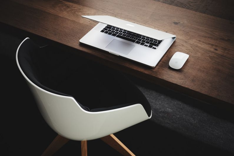 Family Work Balance - Apple MacBook beside computer mouse on table