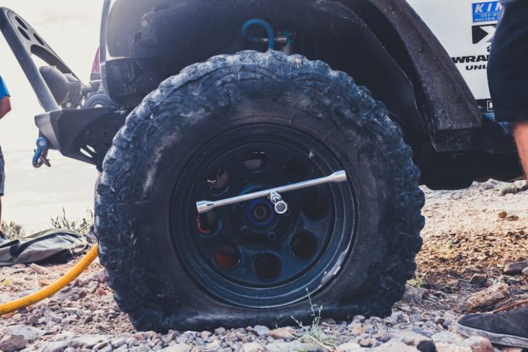 Car Problems - flat tire close-up photography