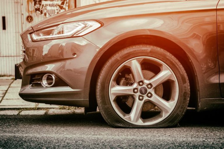 Flat Tire - red mercedes benz c class