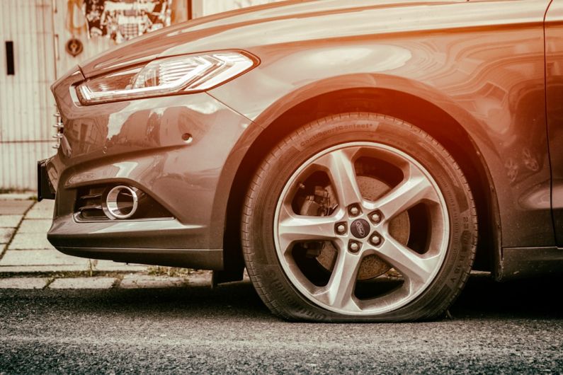 Flat Tire - red mercedes benz c class
