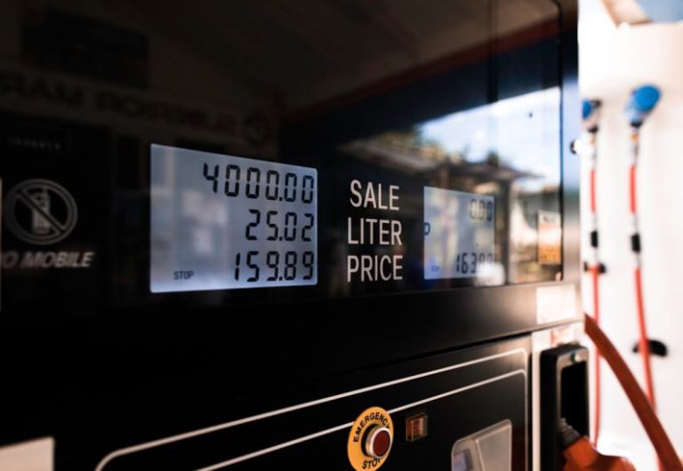 Gas Mileage - black digital device at 2 00
