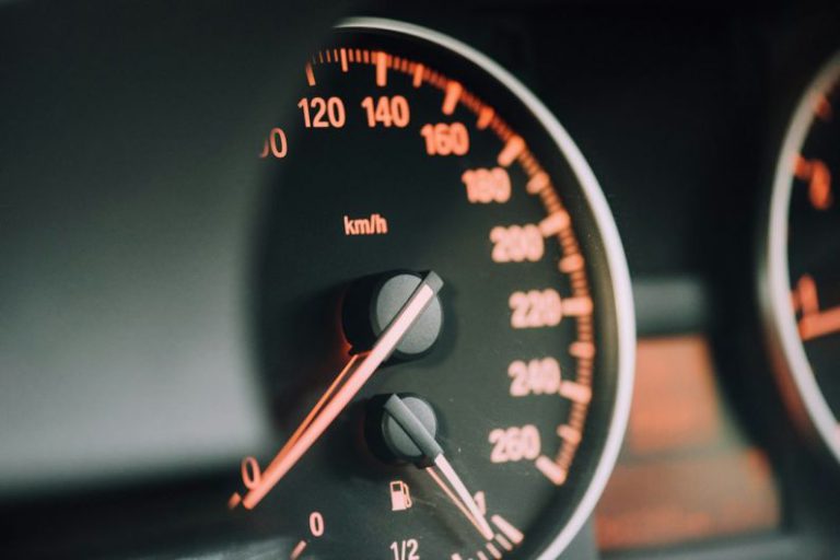 Oil Change - closeup photo of black analog speedometer