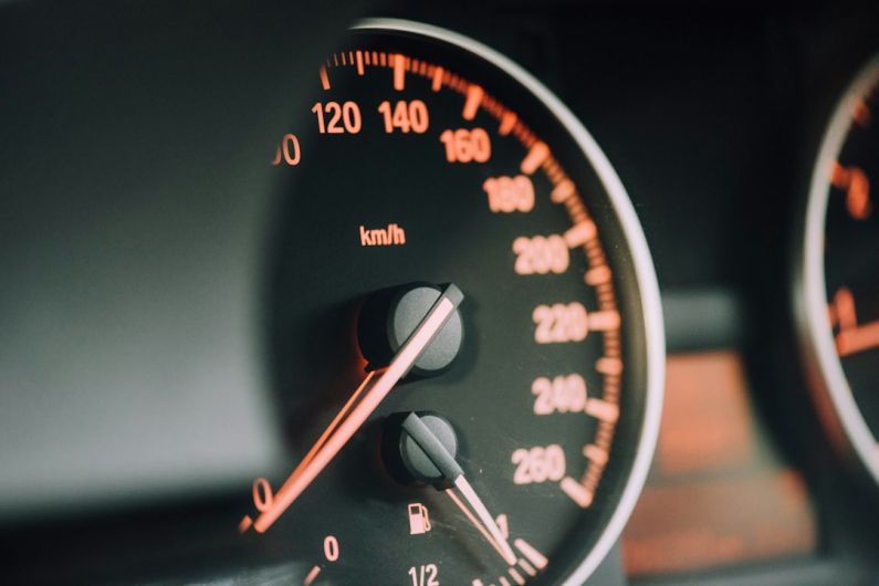 Oil Change - closeup photo of black analog speedometer