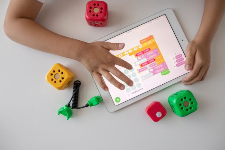 Education Technology - person holding white ipad on white table