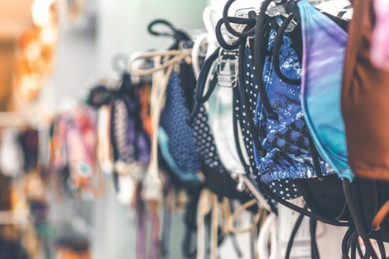 Generic Products - a row of bras hanging on a wall
