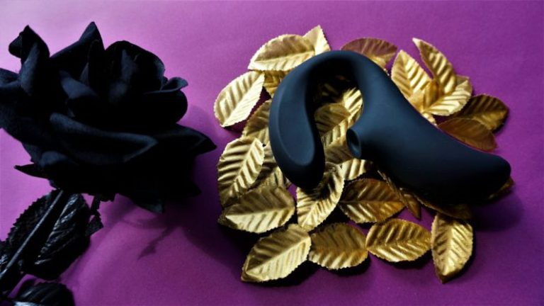 Adult Play - black and brown heart shaped ornament