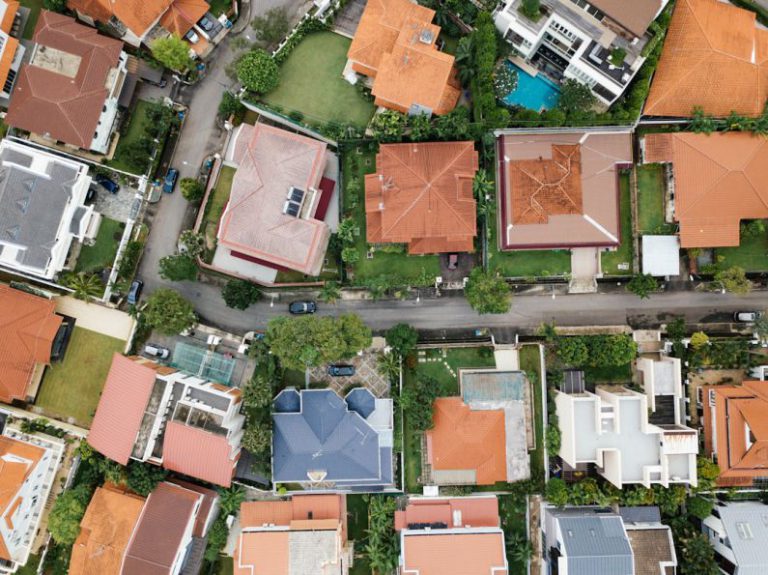 Real Estate Investment - aerial view of city during daytime
