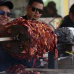 Cooking Shortcuts - Two men are preparing food on a grill