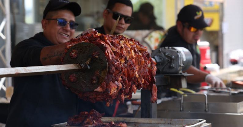 Cooking Shortcuts - Two men are preparing food on a grill