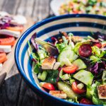 Mediterranean Food - leafy vegetable dish in blue ceramic bowl