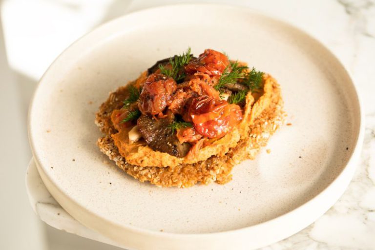 Vegan Recipes - a white plate topped with food on top of a table