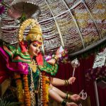 Cultural Festivals - woman in yellow and red traditional dress