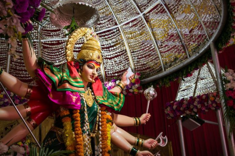 Cultural Festivals - woman in yellow and red traditional dress