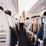 Flight Attendant Tips - shallow focus photography of people inside of passenger plane