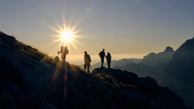 Mountain Hiking - four person on mountain during daytime