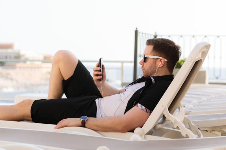 Expat Jobs - man lying on white sun lounger