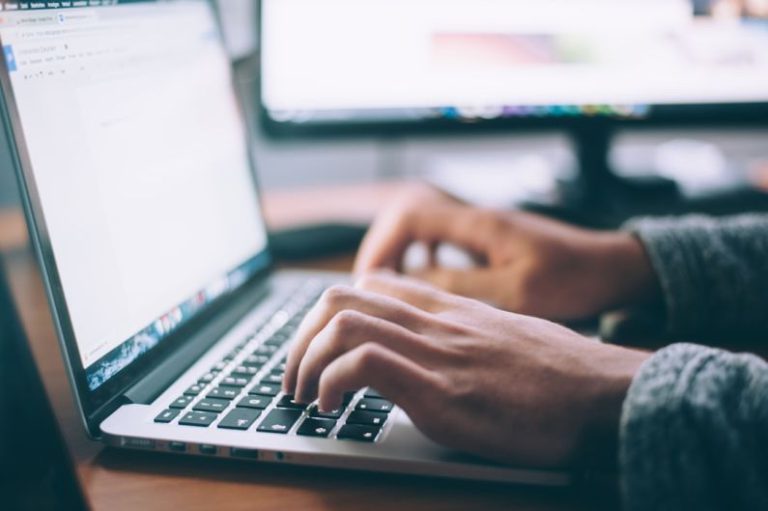 Job Rejection - person using MacBook Pro